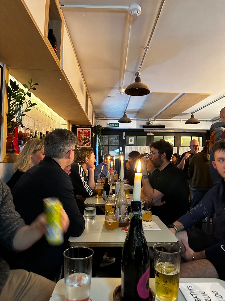 Creatives gathered at the bar after the run